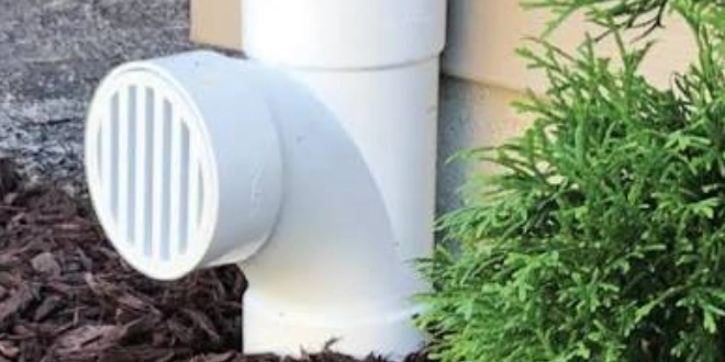 Landscape drainage solution with professional downspout burial